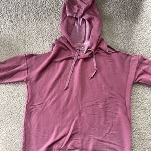 Very pretty pink hoodie with cold shoulders. Size small. American Eagle.